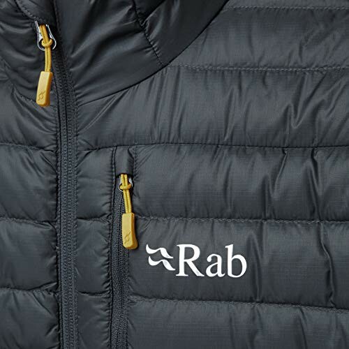Closeup of a Rab down jacket with yellow zippers.